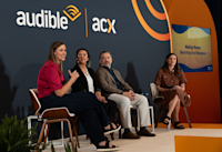 A photo of Amy Daws, Mariana Zapata and LT Ryan discussing marketing strategies with Audible's Jess Guro.
