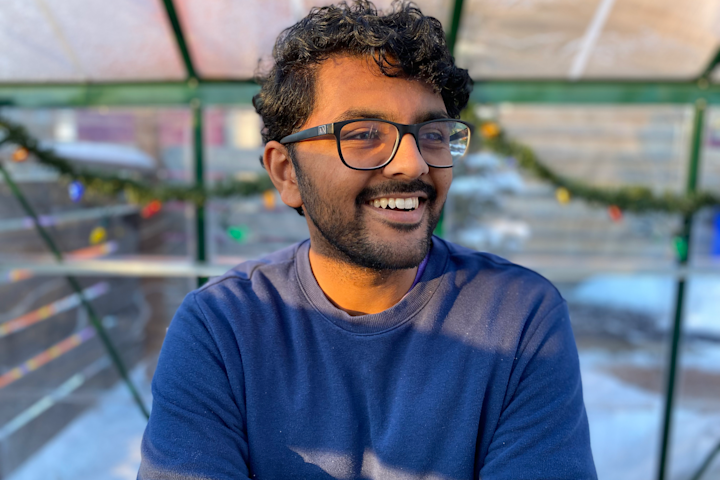 a person smiling for the camera