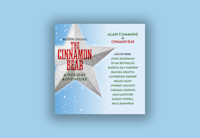 "The Cinnamon Bear" cover art is laid over a snowy blue background. It features a large silver star with the title overlay in red and green text. The full cast list is listed on the right side.