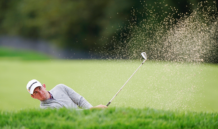 Lucas Herbert splashes from the sand on the 14th at Winged Foot. Picture: USGA