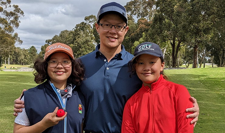 Jonathan Woon with his daughters Cleo and Cassandra.
