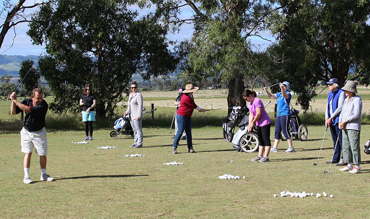 Cluning giving a lesson to the female beginners.