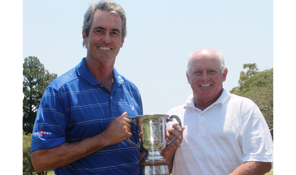Previous Queensland Open winners Ian Baker-Finch (1990) and Peter Senior (1984) with the T.B. Hunter Cup.
