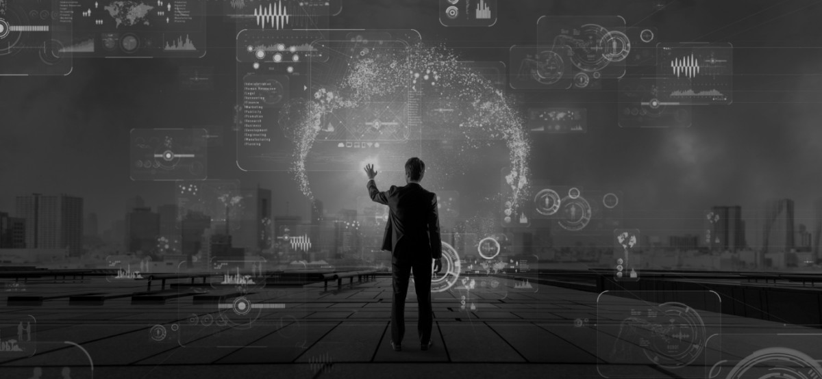 Man looking at screen with technology