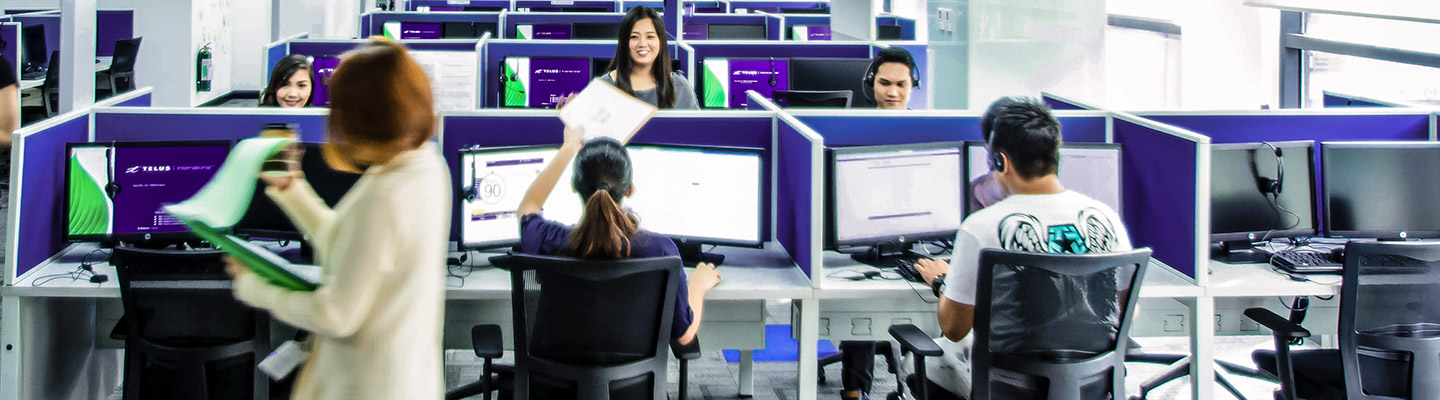 TELUS International office and employees