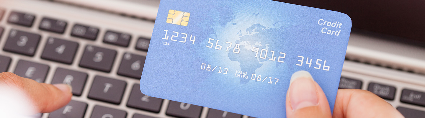 holding a credit card