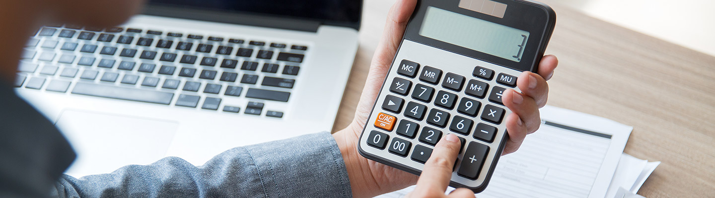 person using calculator