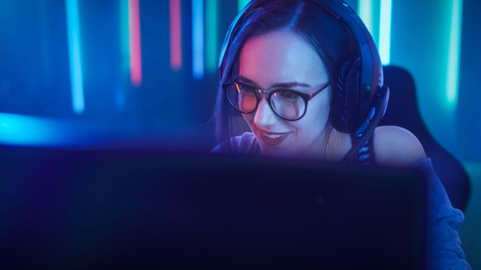 Gaming support employees sitting at their desks