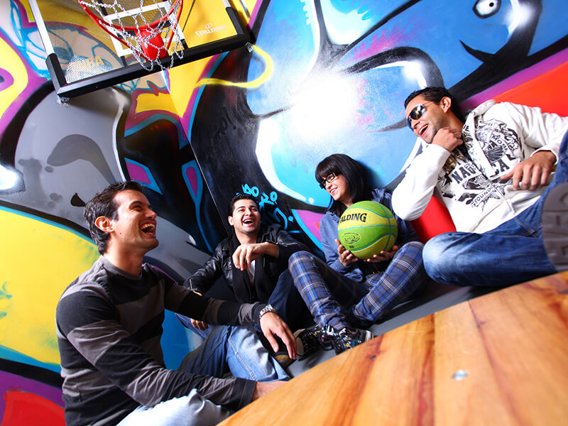 Player support agents talking on a basketball court