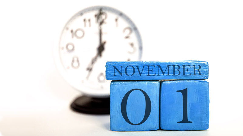 November 1 calendar with clock behind it