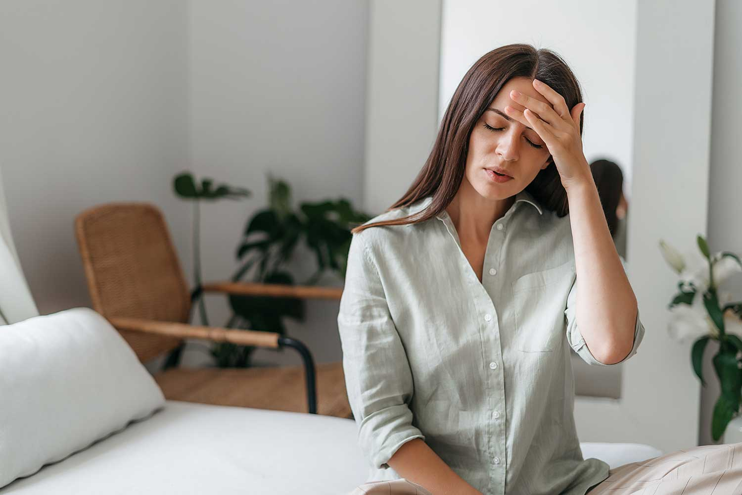 Mujer con dolor de cabeza