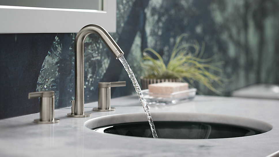 With a slim profile and tubular design, this faucet mirrors the round shape of the lavatory.