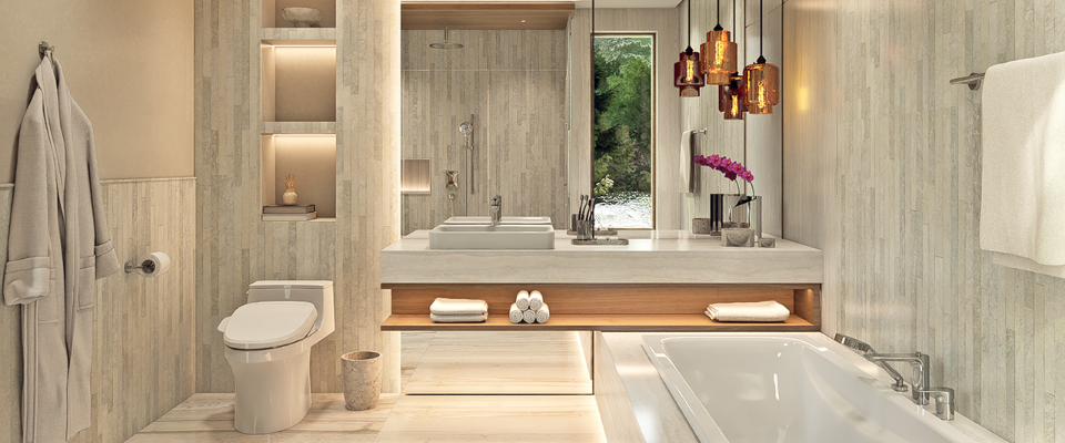 Kamar mandi luas dengan kloset, wastafel ganda, dan bathtub