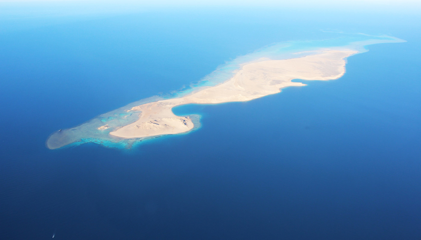 Aerial view of island surrounded by water