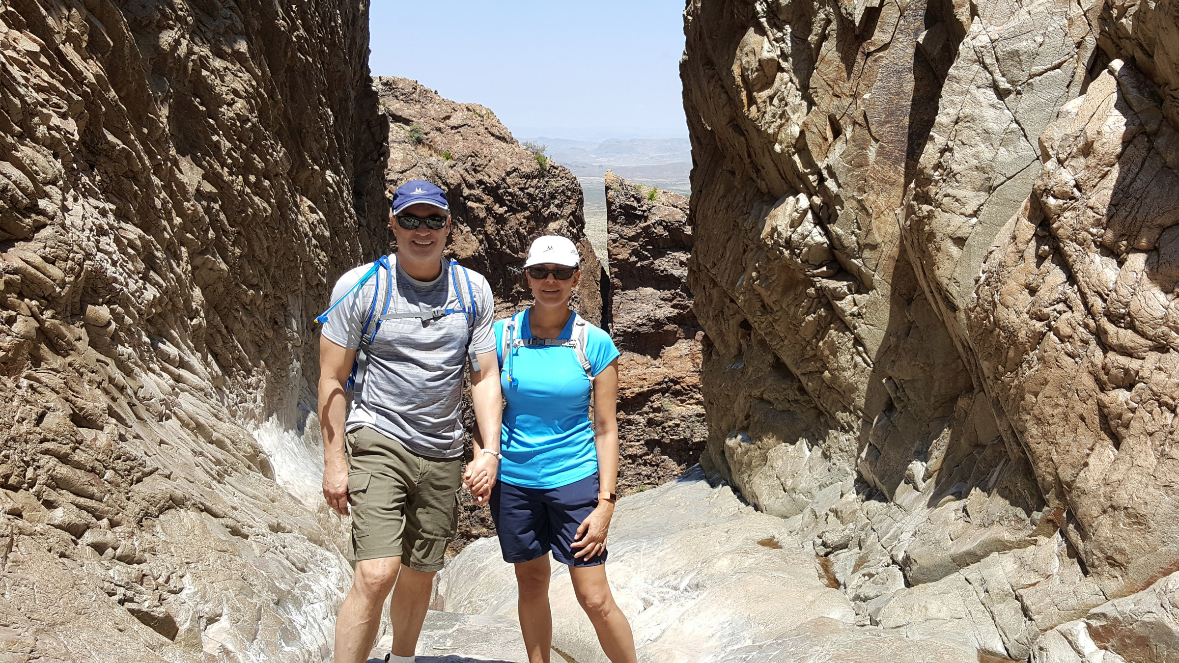 Christian Scarborough is pictured on a hike with his wife.