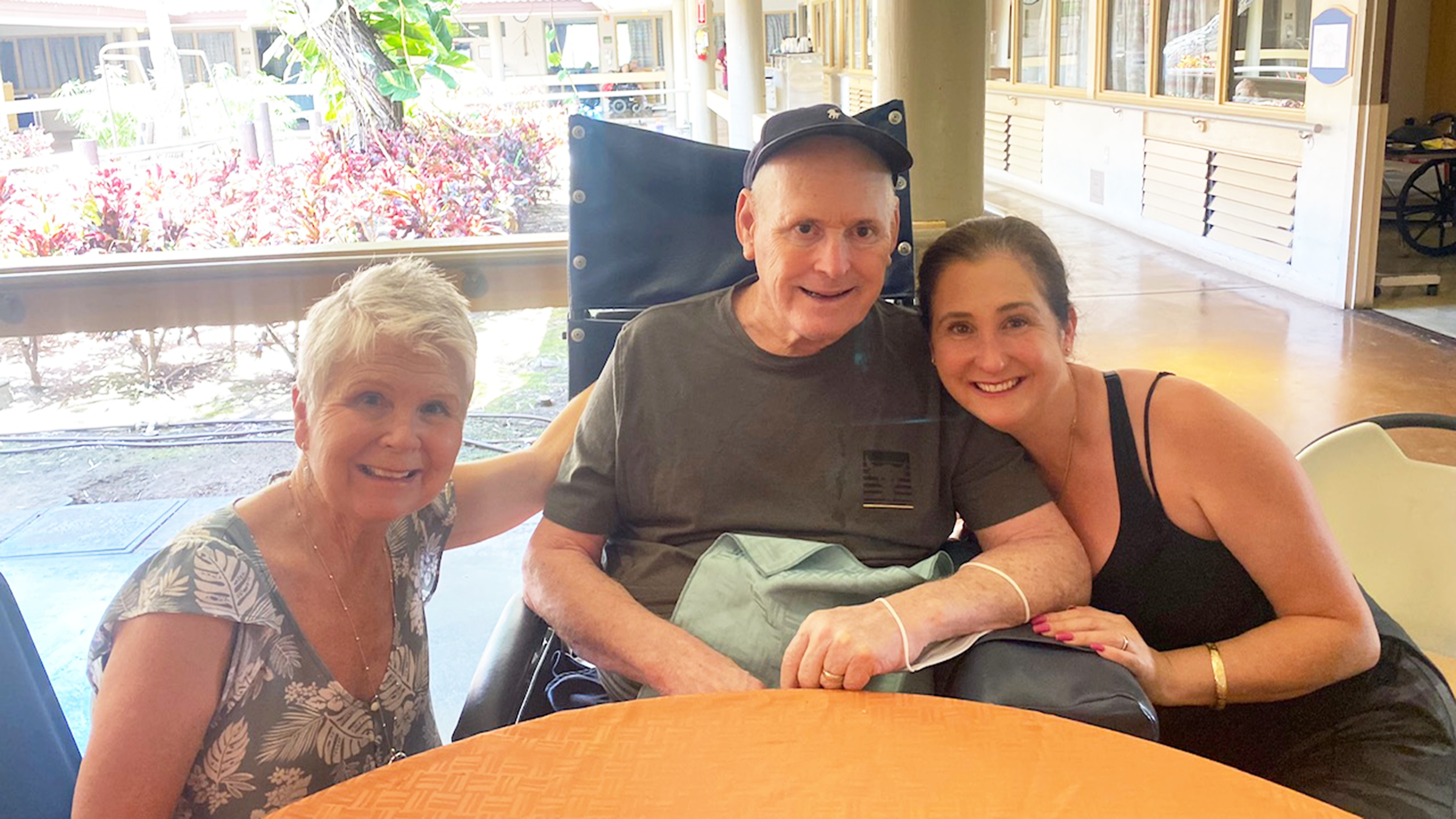 Melissa Fisher pictured with both of her parents.