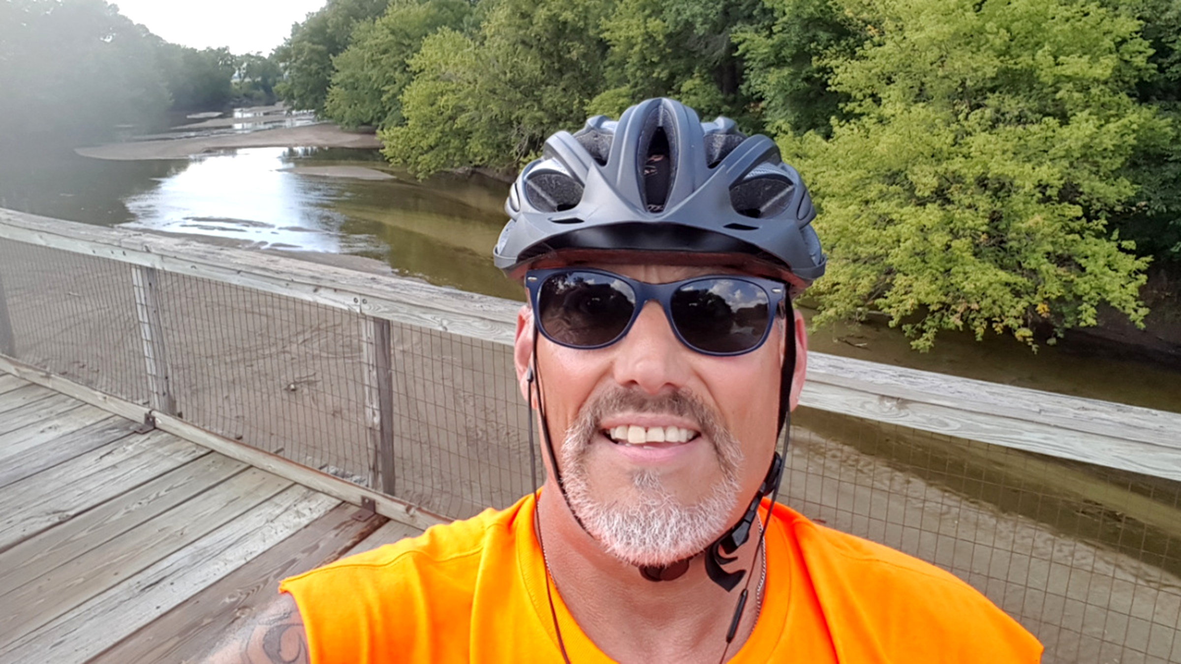 Jim O’Brien is pictured biking in 2017.