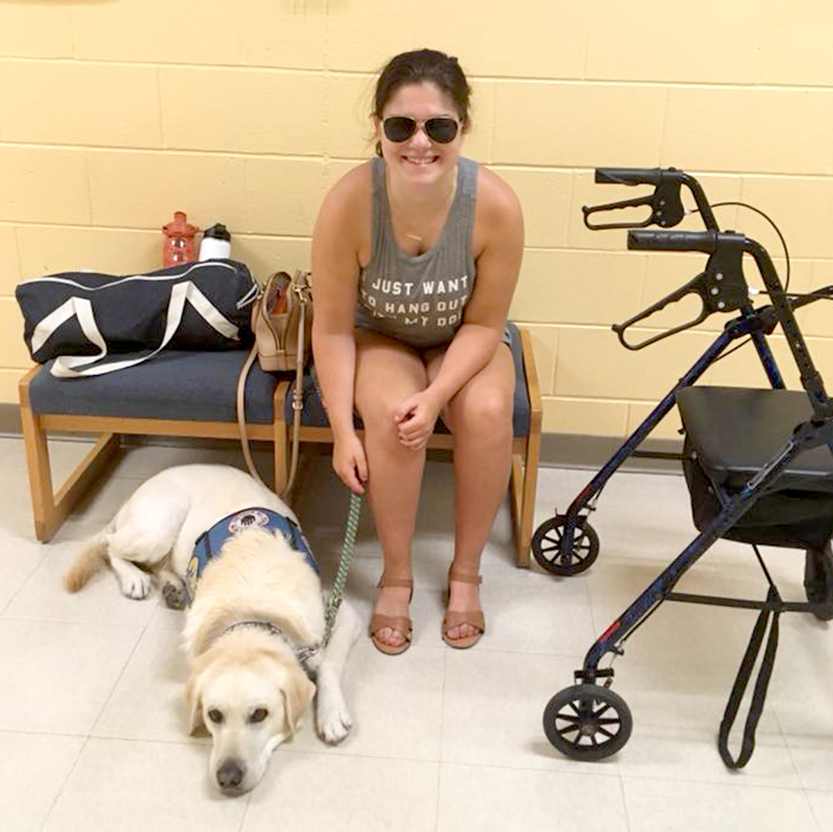 Morgan McCarthy is pictured with her support dog, Dewye.