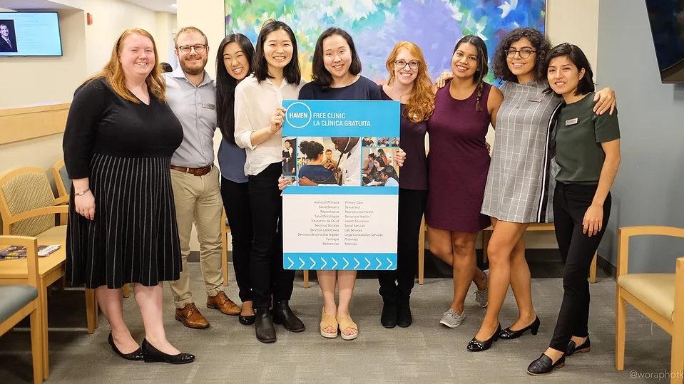 HAVEN free clinic group holding up sign