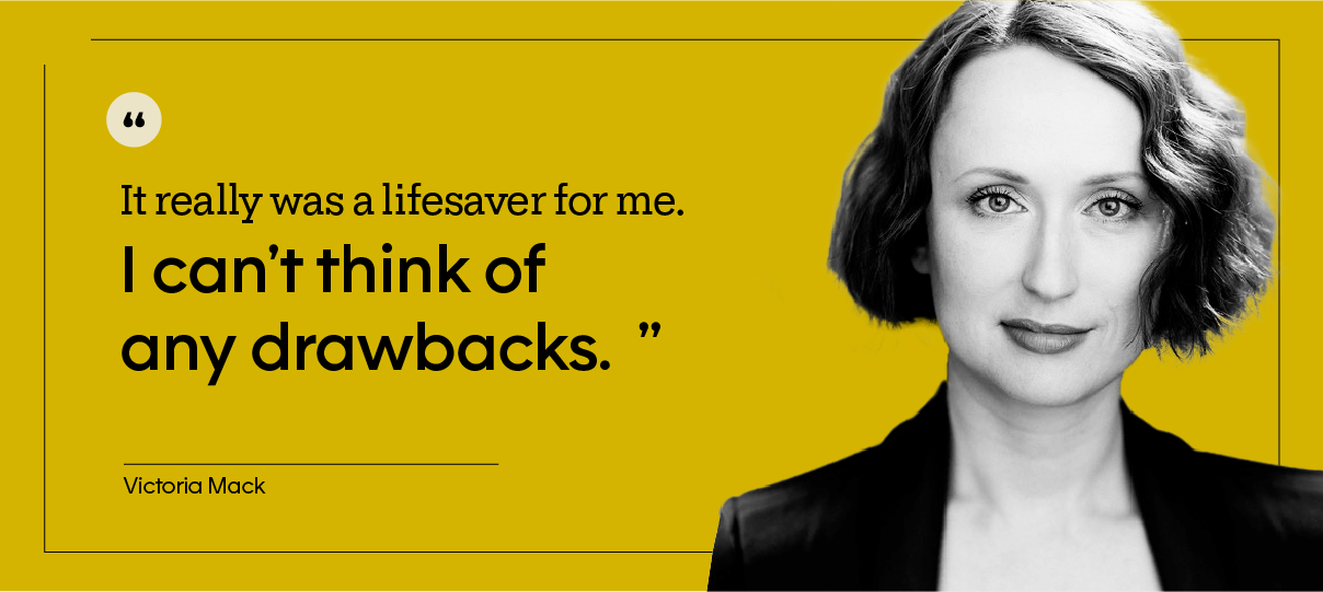 This is a portrait of Victoria Mack, who has a short red bob and is wearing a green blazer.