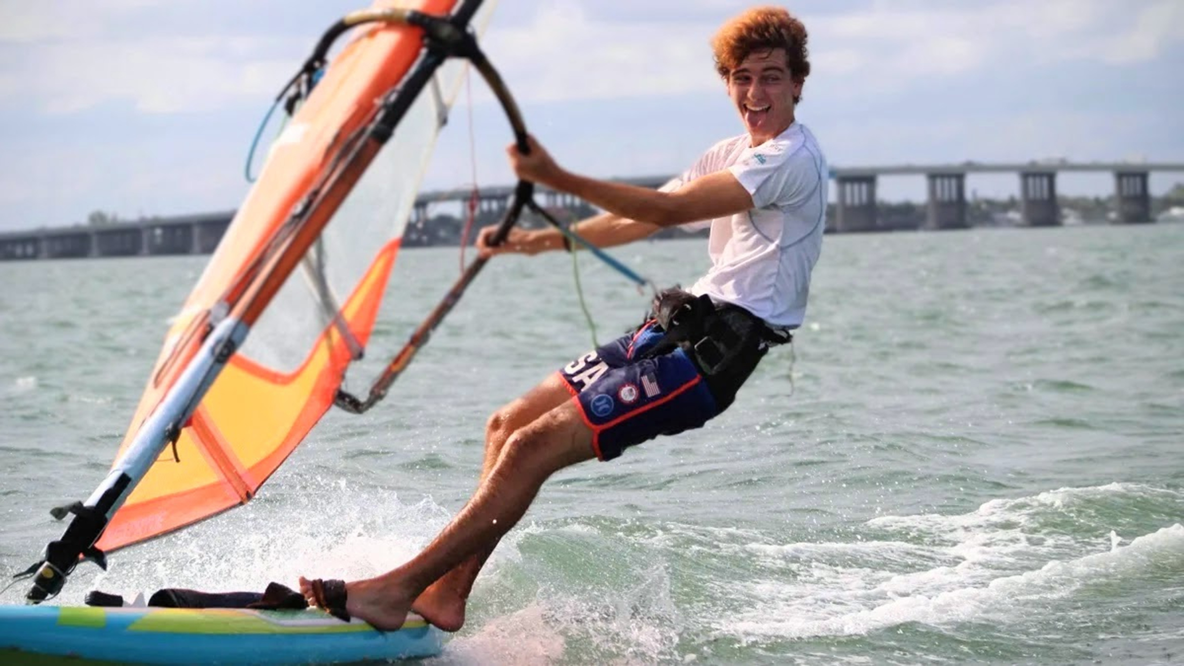 Michael Cramer is pictured windsurfing.