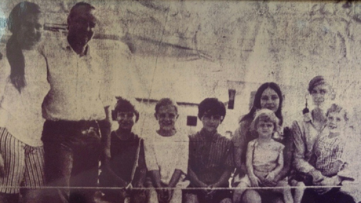 The Larson family in the 1970s aboard a 50-foot wooden sailboat. Mike Larson is far right with his little brother on his lap.