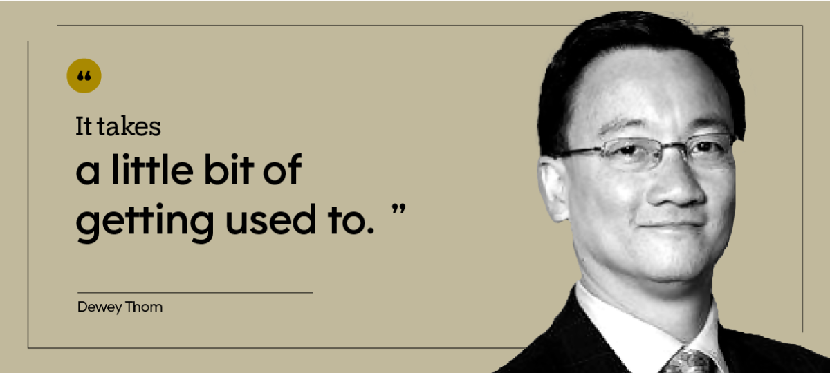 Dewey Thom is pictured in a headshot.