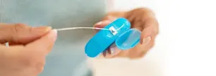 La Historia del Hilo Dental article link