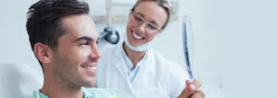 Limpieza dental profesional en el dentista article link