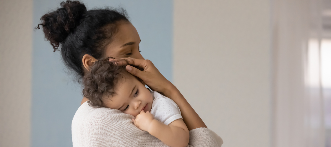 Mom comforting baby