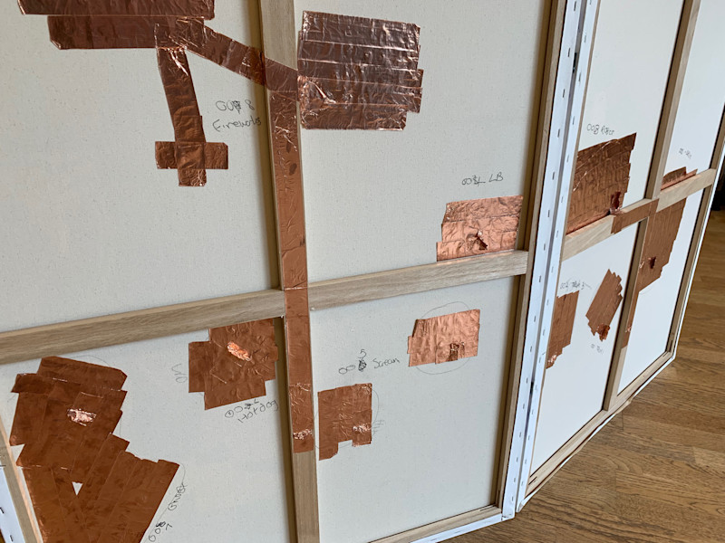 The back of the canvas shows the copper tape used to create a conductive surface.