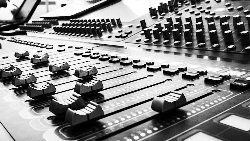 Image of slider controls from an audio control board