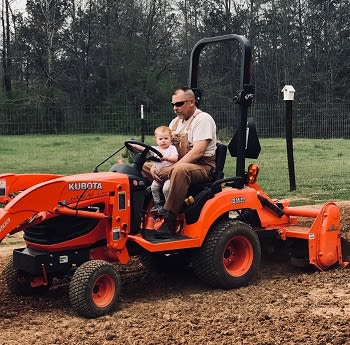Skeeter Sims (landowner, AL)-on tractor