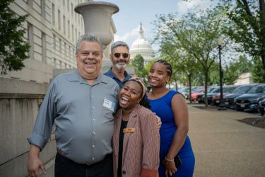 Landowners from Pennsylvania take a picture with AFF's Jasmine Brown (Senior Manager, Landowner Stewardship) and Allyah Keith (Community Sustained Engagement Summer Intern) in front of the Capitol Building. ©Stephen Taglieri