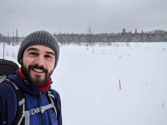 Ethan Ragan, AFF's Outreach Forester, on a winter hike.