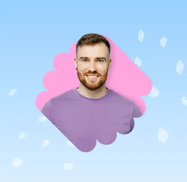 A head shot of a man who's in front of a blue background.