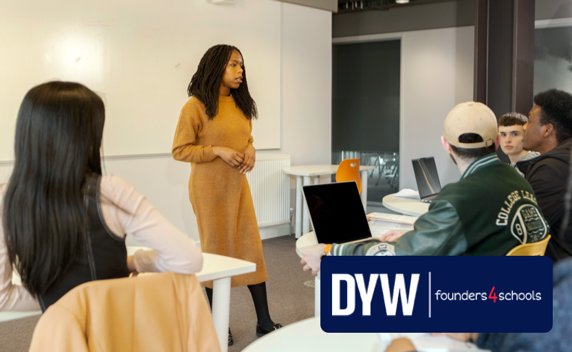 An employer delivering a talk to young people in a college classroom. A logo over the image reads: DYW Founders 4 Schools