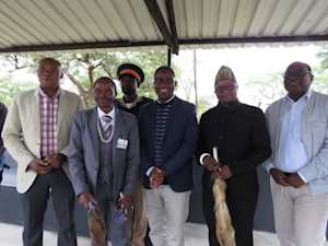 Their Majesties Chief Chitambo (grey suit) and Chief Muchinka (black suit)