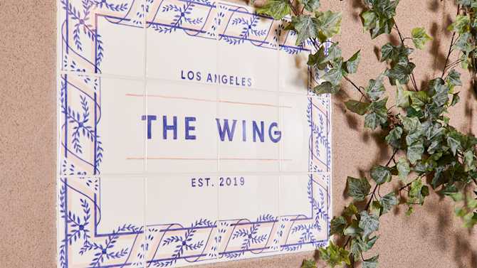 The tile plaque at the entrance of the Wing.