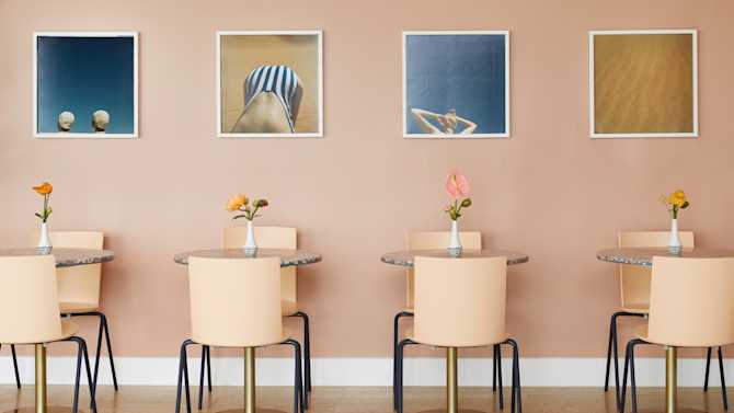 A photo of seating area in The Wing Williamsburg