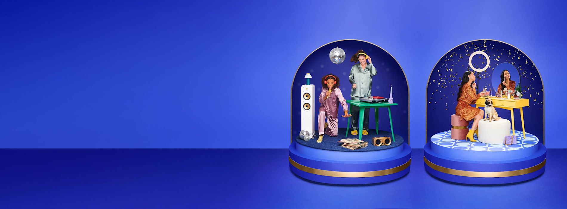 Two snow globes with people in them
