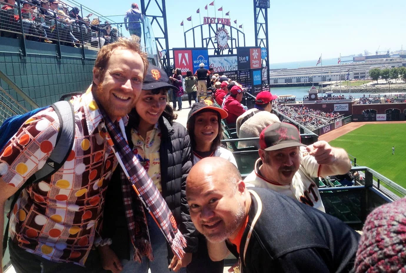 Members of OnLok attend a baseball game