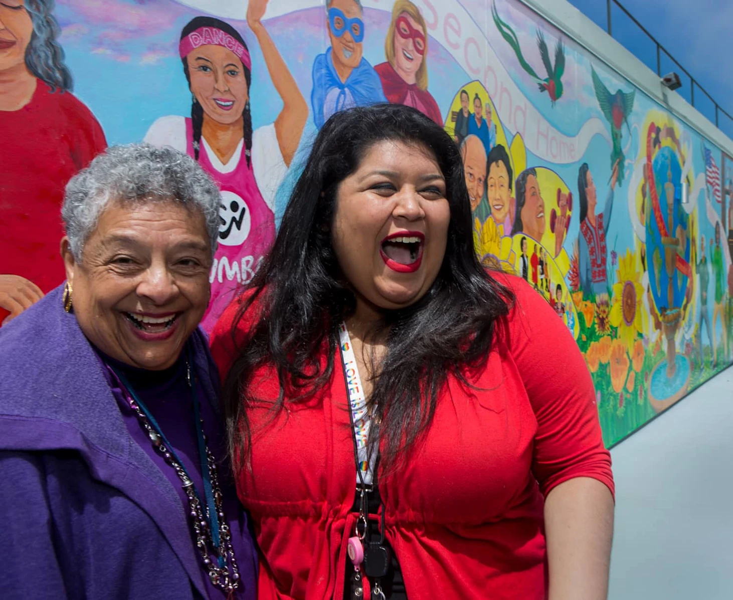 Sandra and Maggie in front of mural