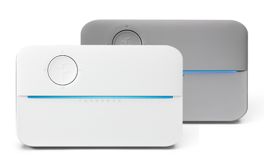 Rachio 3 smart sprinkler controller on blue wall