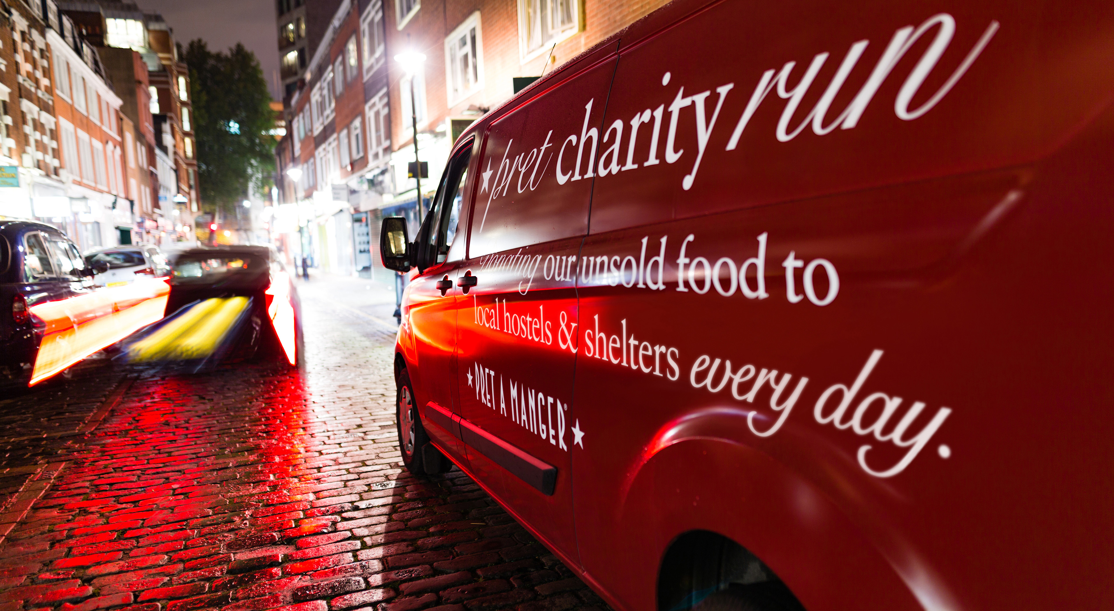 Pret's charity vans making food donations in streets of London to charities supporting homeless people.