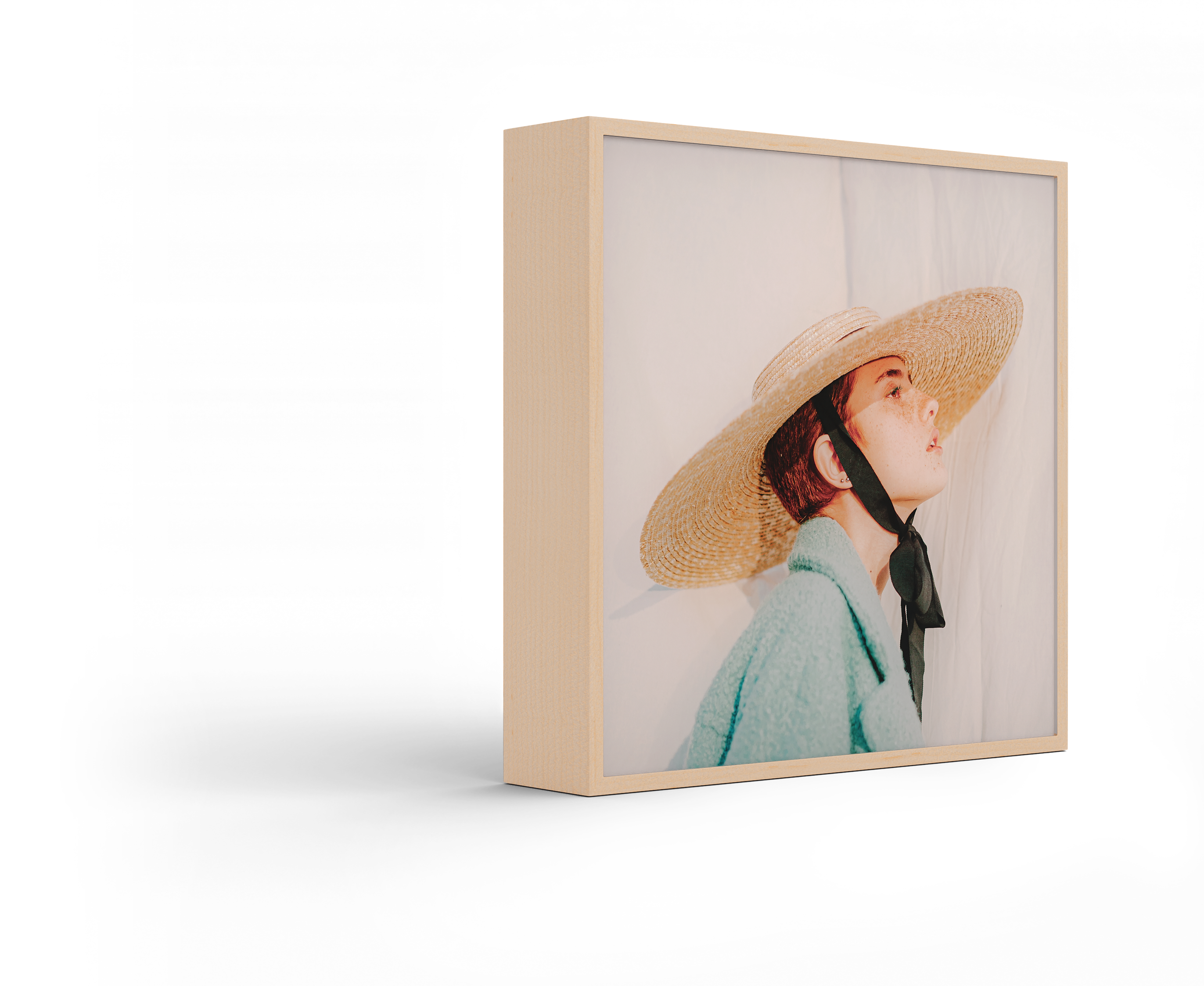 Standing ArtBox with frame color Natural maple against a white background.