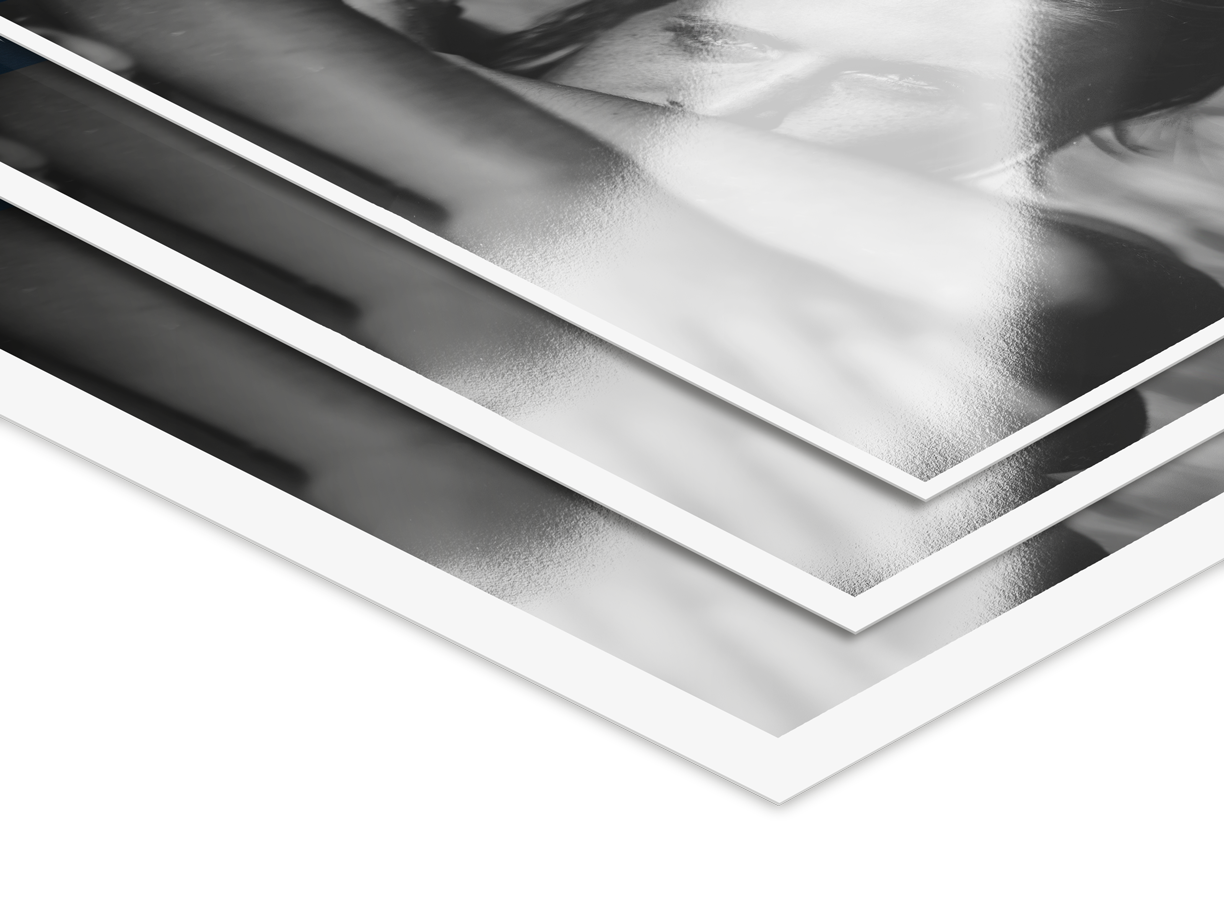 close up of 3 LightJet prints on Ilford Baryta paper with different white border widths.