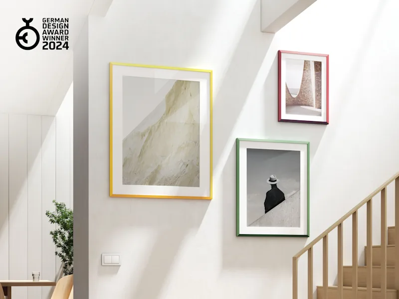 Frame: WhiteWall Design Edition by Studio Besau-Marguerre Three design edition frames by Studio Besau-Marguerre, one of each color, hanging on a wall.