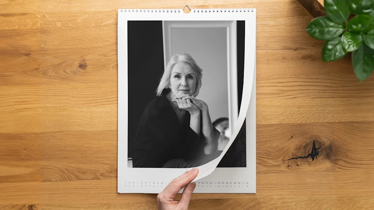 photo calendar with portrait motif Black and white portrait in a wall calendar displayed on wooden surface.