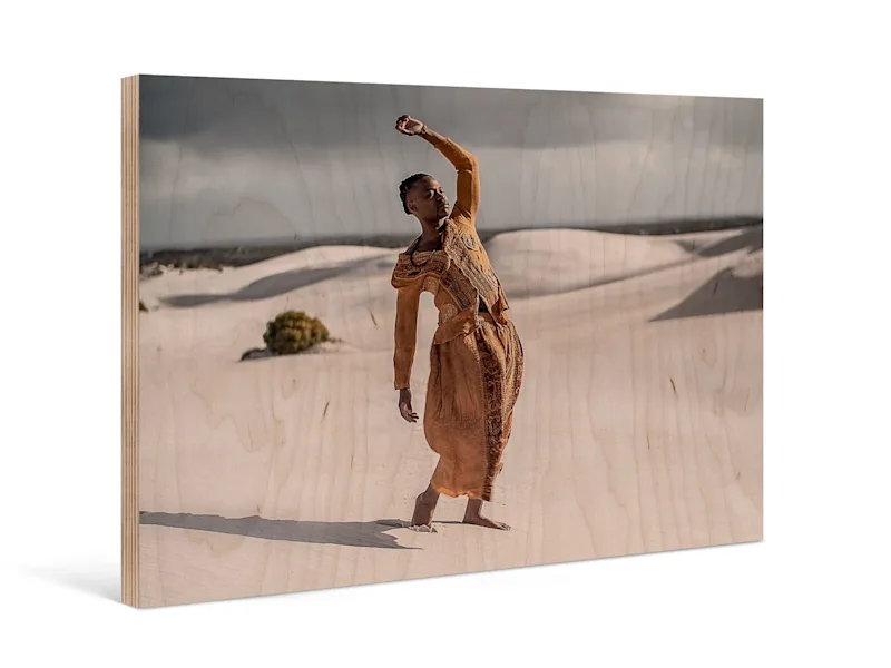 Direct Print On Wood A person stands in front of sand dunes in a desert on a direct print on wood.